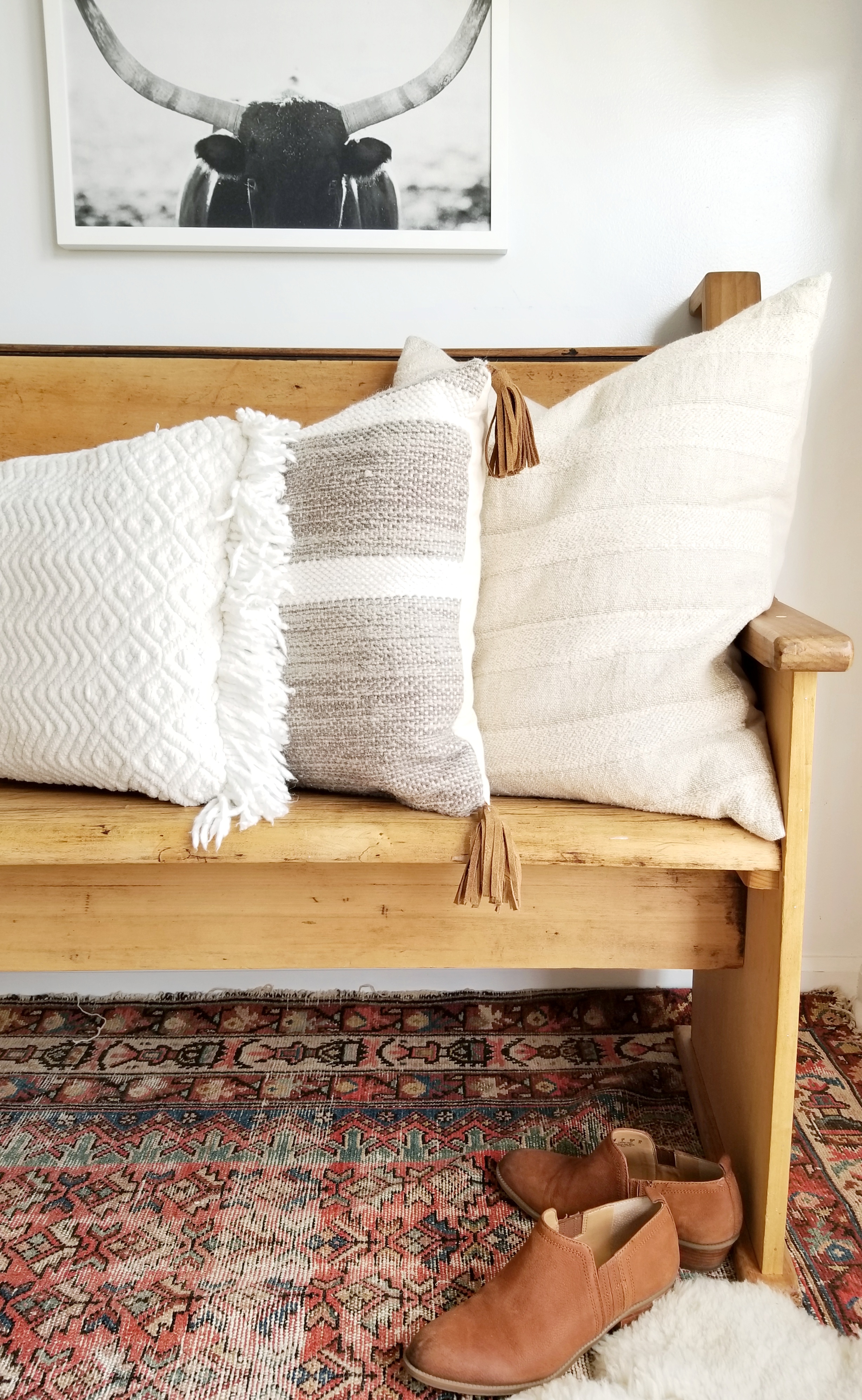 Use throw pillows to add texture to your modern farmhouse decor.