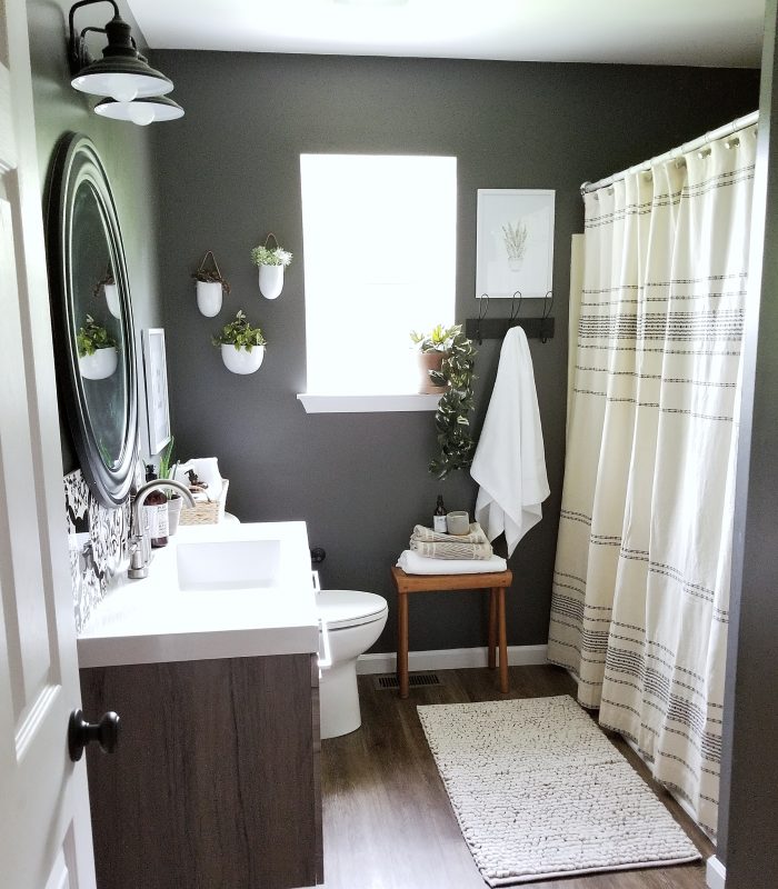 Simple Steps to take your bathroom from boring to beautiful. Neutral Modern Farmhouse bathroom by Cynthia Harper.